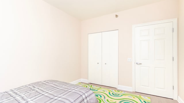 1111 S Wabash Ave Unit 1604, Chicago, IL 60605 - bedroom featuring baseboards and a closet