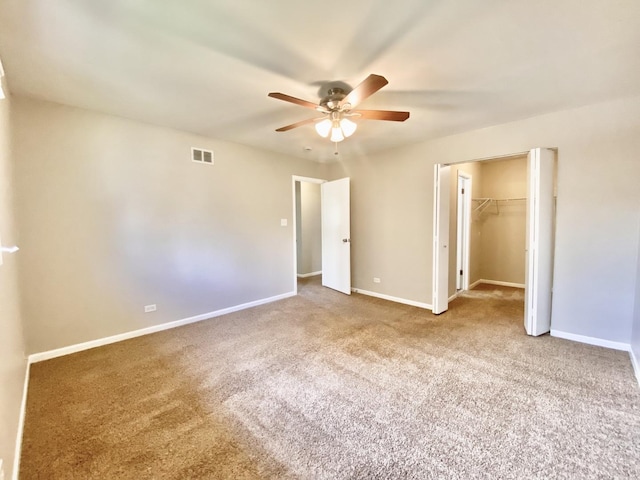 22962 Bruce Dr, Richton Park, IL 60471 - unfurnished bedroom featuring carpet floors, baseboards, a spacious closet, a closet, and ceiling fan