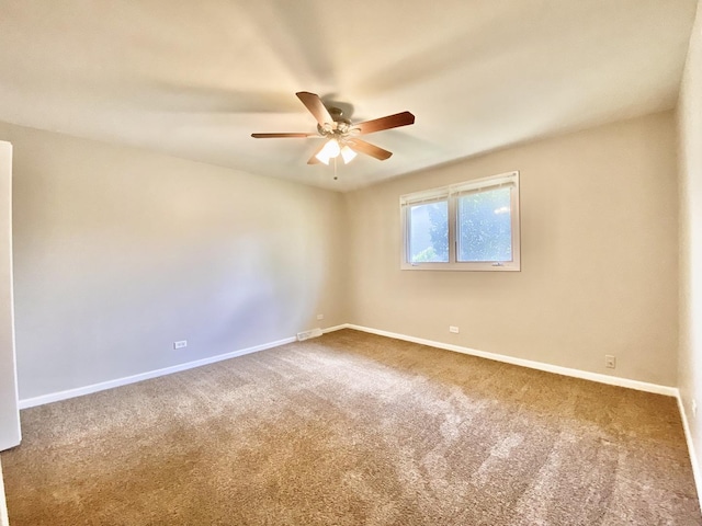 22962 Bruce Dr, Richton Park, IL 60471 - empty room featuring ceiling fan, carpet, and baseboards