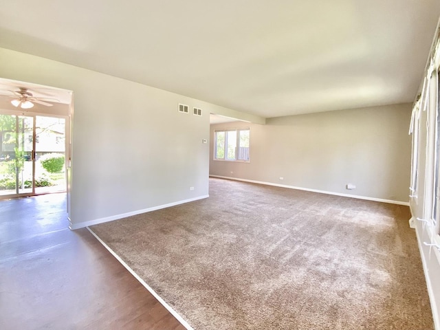 22962 Bruce Dr, Richton Park, IL 60471 - spare room featuring baseboards and ceiling fan