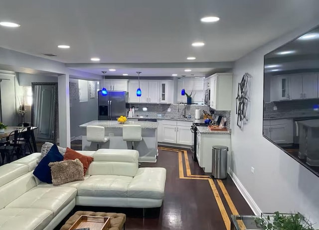4148 S King Dr Unit G3, Chicago, IL 60653 - living room with baseboards, recessed lighting, and dark wood-type flooring