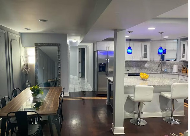 4148 S King Dr Unit G3, Chicago, IL 60653 - dining space with wood finished floors, recessed lighting, and baseboards