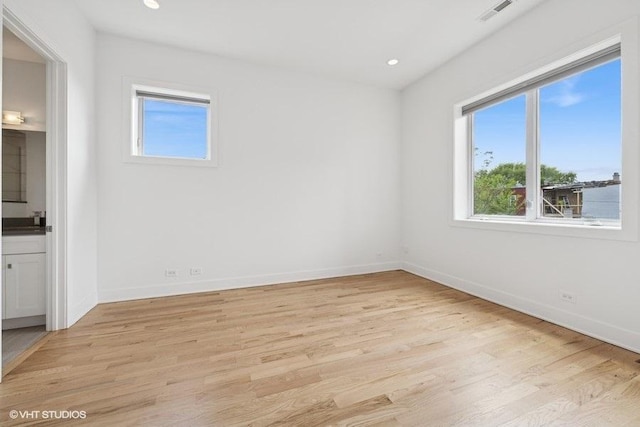 2505 W Potomac Ave Unit 3W, Chicago, IL 60622 - unfurnished room with plenty of natural light, light wood-style flooring, baseboards, and recessed lighting