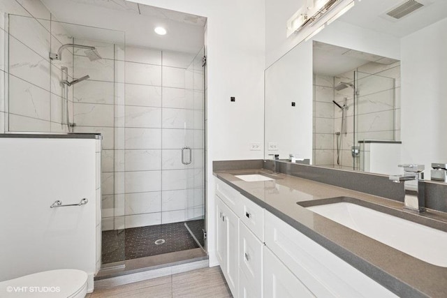 2505 W Potomac Ave Unit 3W, Chicago, IL 60622 - full bath featuring toilet, a shower stall, double vanity, and recessed lighting