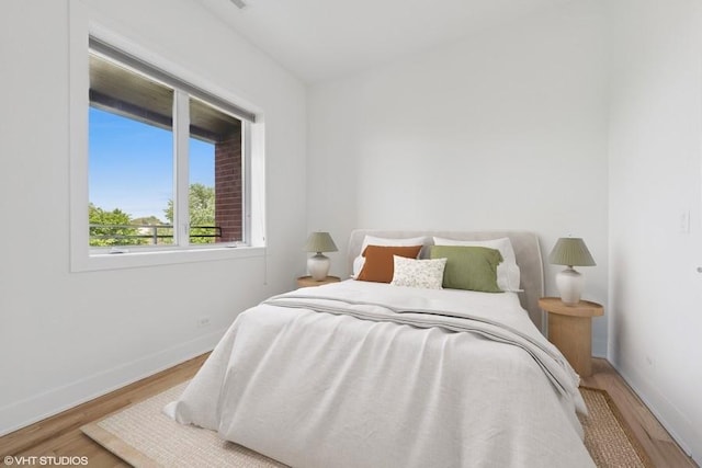 2505 W Potomac Ave Unit 3W, Chicago, IL 60622 - bedroom with wood finished floors and baseboards