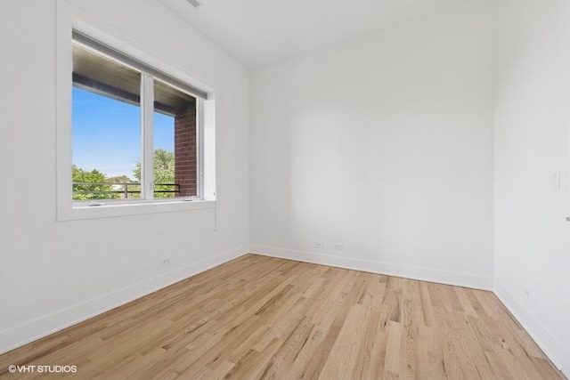 2505 W Potomac Ave Unit 3W, Chicago, IL 60622 - empty room featuring wood finished floors and baseboards