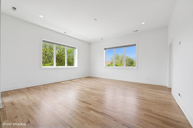 2505 W Potomac Ave Unit 3W, Chicago, IL 60622 - empty room featuring light wood-style floors, baseboards, and recessed lighting