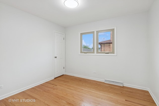 3838 Emerson Dr, Schiller Park, IL 60176 - empty room with baseboards and light wood-style floors