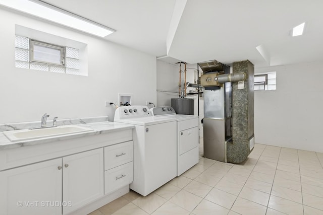 3838 Emerson Dr, Schiller Park, IL 60176 - laundry room featuring washer and dryer, a sink, water heater, and heating unit