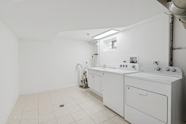 3838 Emerson Dr, Schiller Park, IL 60176 - washroom with washing machine and dryer, cabinet space, baseboards, and light tile patterned floors
