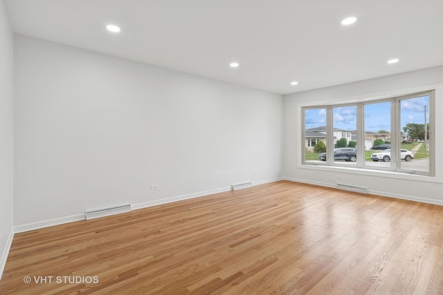 3838 Emerson Dr, Schiller Park, IL 60176 - spare room with light wood-style flooring, baseboards, and recessed lighting