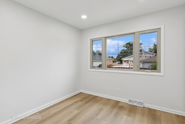 3838 Emerson Dr, Schiller Park, IL 60176 - spare room featuring baseboards, light wood-style flooring, and recessed lighting