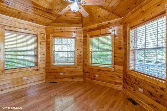2140 Cedar Ct, Glenview, IL 60025 - empty room featuring vaulted ceiling, a ceiling fan, wood walls, wood finished floors, and wood ceiling