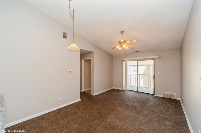 2028 N Rand Rd Unit 202, Palatine, IL 60074 - spare room featuring dark carpet, a ceiling fan, baseboards, and vaulted ceiling