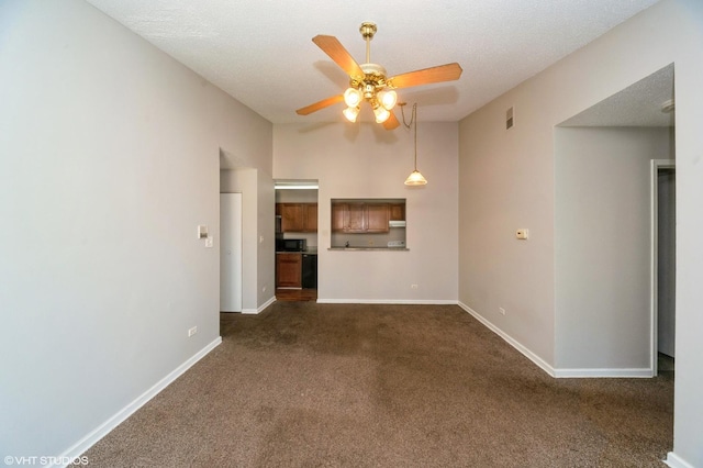 2028 N Rand Rd Unit 202, Palatine, IL 60074 - unfurnished living room with ceiling fan, dark carpet, and baseboards