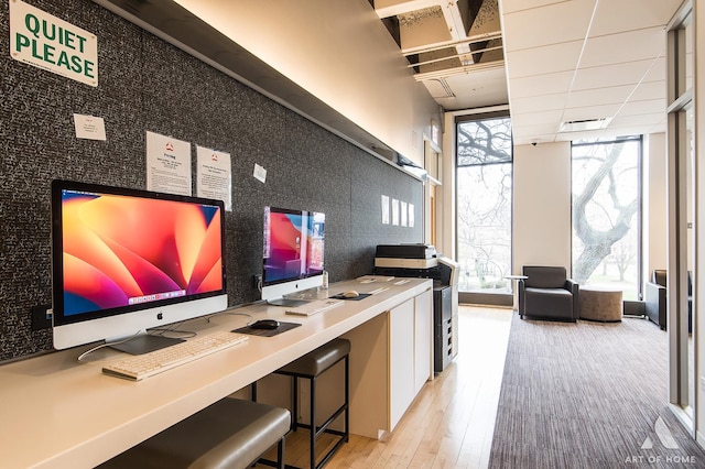 505 N Lake Shore Dr Unit 2017, Chicago, IL 60611 - home office featuring a wall of windows, plenty of natural light, and wood finished floors