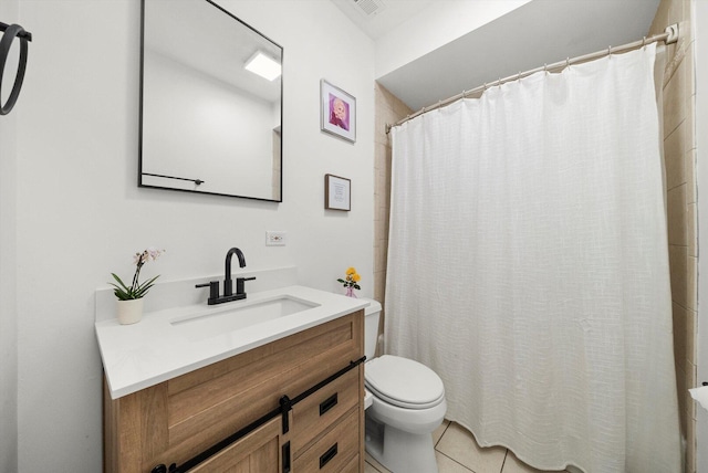 bathroom with toilet, vanity, a shower with shower curtain, and tile patterned flooring