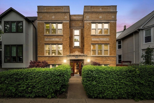 view of front of home with brick siding