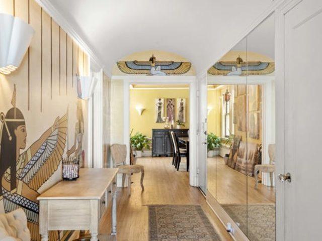7321 S S Shore Dr Unit 11-B, Chicago, IL 60649 - corridor with wood finished floors and plenty of natural light