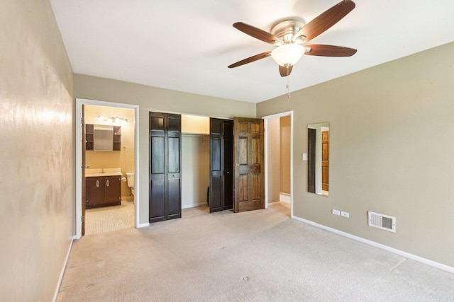 7333 Grand Ave Unit 102, Downers Grove, IL 60516 - unfurnished bedroom featuring light colored carpet, baseboards, and a closet