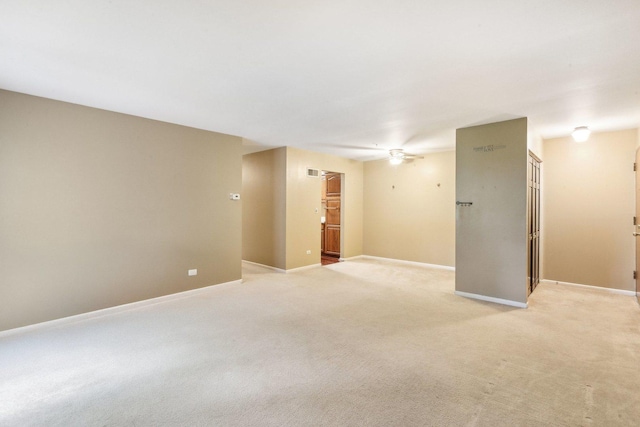 7333 Grand Ave Unit 102, Downers Grove, IL 60516 - spare room with light carpet and baseboards