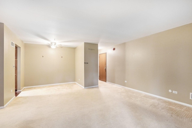 7333 Grand Ave Unit 102, Downers Grove, IL 60516 - empty room with a ceiling fan, light colored carpet, and baseboards
