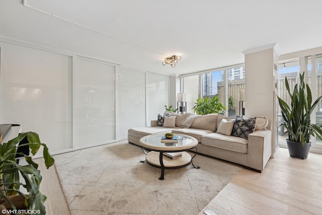 1516 N State Pkwy Unit 5D, Chicago, IL 60610 - living area featuring floor to ceiling windows and light wood-type flooring