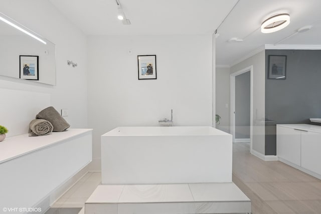 1516 N State Pkwy Unit 5D, Chicago, IL 60610 - full bathroom with a soaking tub, baseboards, and ornamental molding