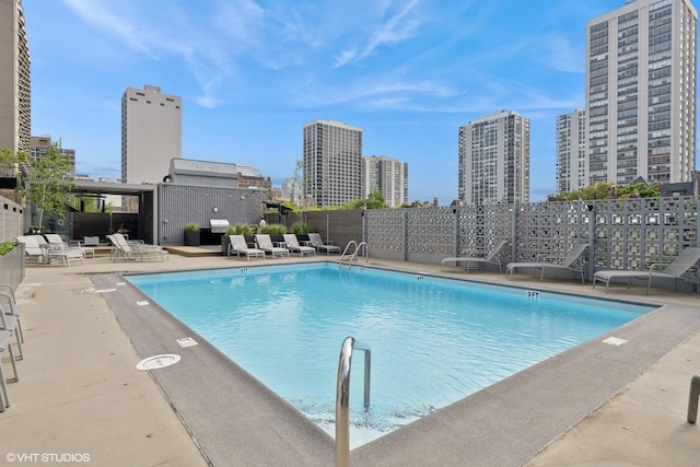 1516 N State Pkwy Unit 5D, Chicago, IL 60610 - community pool with a city view and a patio area