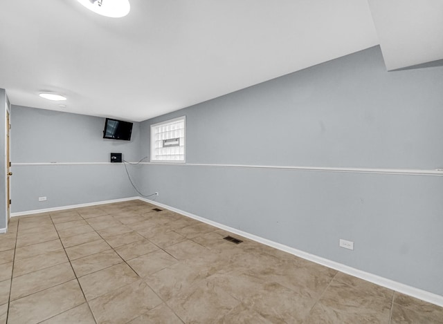 9040 Meadowview Dr, Hickory Hills, IL 60457 - basement featuring baseboards and tile patterned flooring