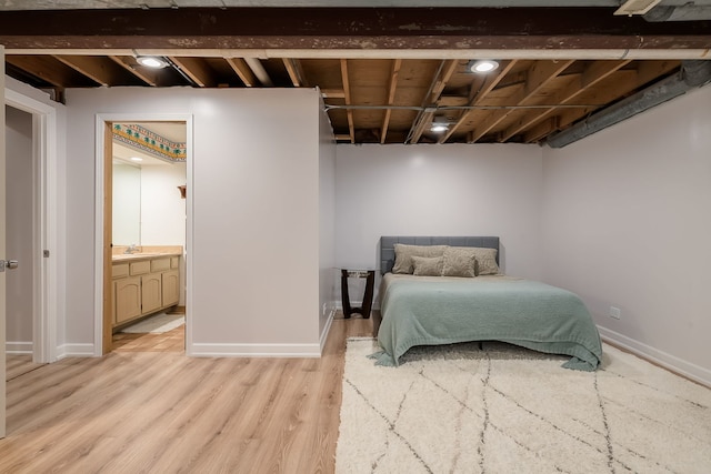 16 Lucas Dr, Palos Hills, IL 60465 - bedroom featuring light wood finished floors, baseboards, and a sink