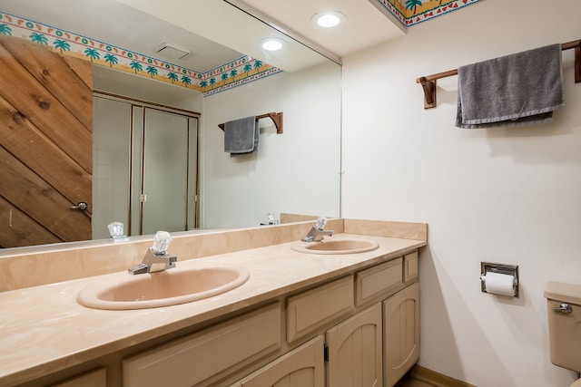 16 Lucas Dr, Palos Hills, IL 60465 - full bathroom with a stall shower, double vanity, toilet, and baseboards