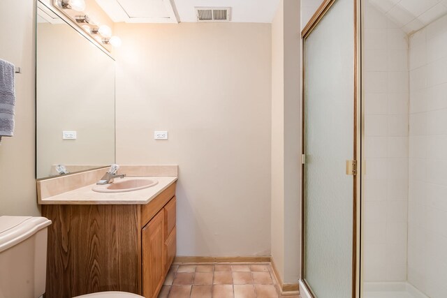 16 Lucas Dr, Palos Hills, IL 60465 - bathroom with toilet, a shower stall, tile patterned flooring, and vanity