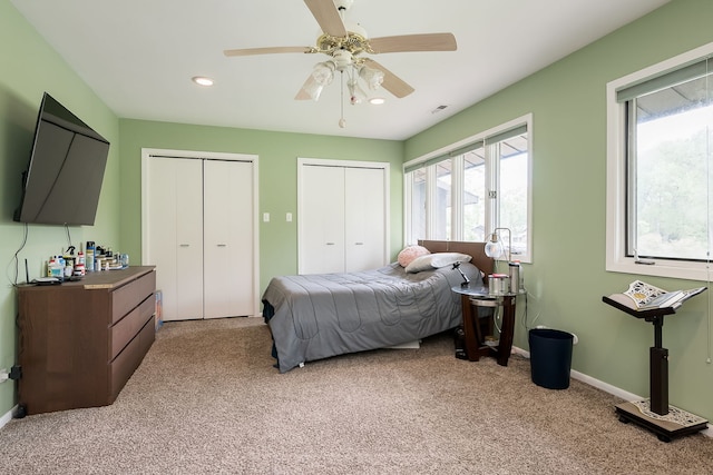 16 Lucas Dr, Palos Hills, IL 60465 - bedroom featuring two closets, light carpet, recessed lighting, ceiling fan, and baseboards