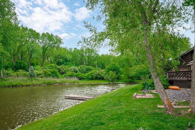 16 Lucas Dr, Palos Hills, IL 60465 - view of green lawn featuring a floating dock and a deck with water view