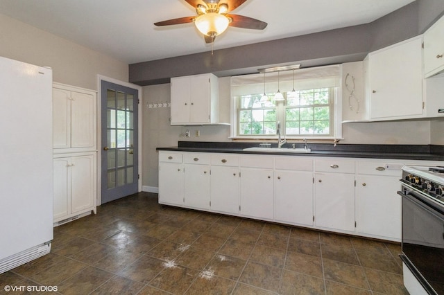 170 Wallace St, New Lenox, IL 60451 - kitchen with freestanding refrigerator, a sink, electric range, and dark countertops
