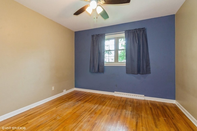 170 Wallace St, New Lenox, IL 60451 - empty room with wood-type flooring, baseboard heating, baseboards, and a ceiling fan