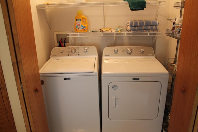 laundry area featuring washer and clothes dryer