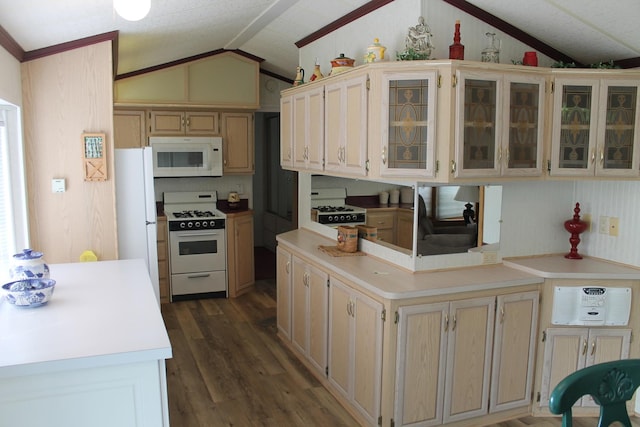 kitchen featuring white appliances, lofted ceiling, dark wood-style flooring, light countertops, and glass insert cabinets