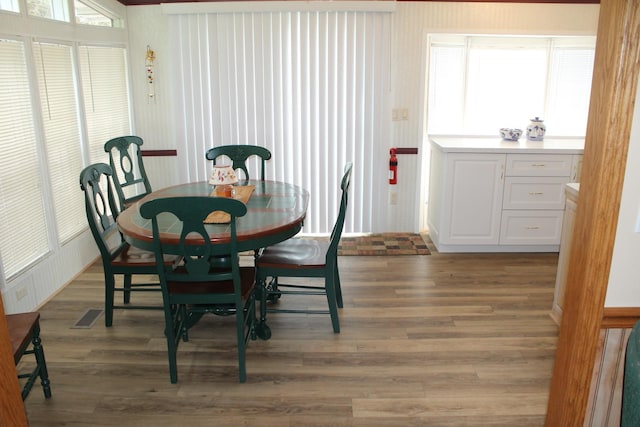 dining area featuring light wood finished floors