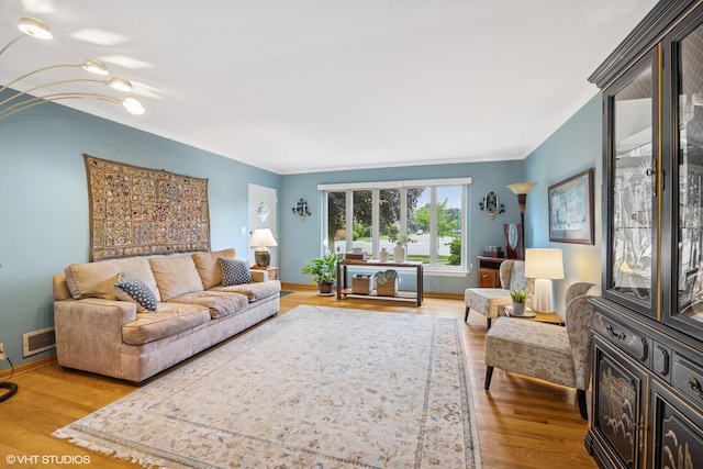 273 Desplaines Ave, Riverside, IL 60546 - living room with ornamental molding, wood finished floors, and baseboards
