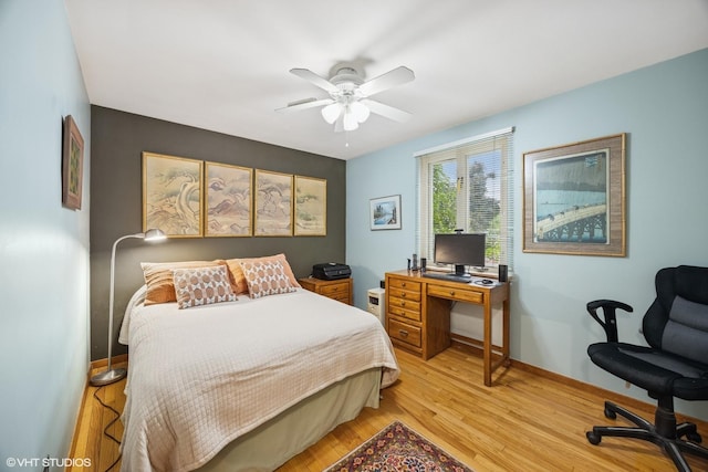 273 Desplaines Ave, Riverside, IL 60546 - bedroom with a desk, light wood-style floors, and baseboards