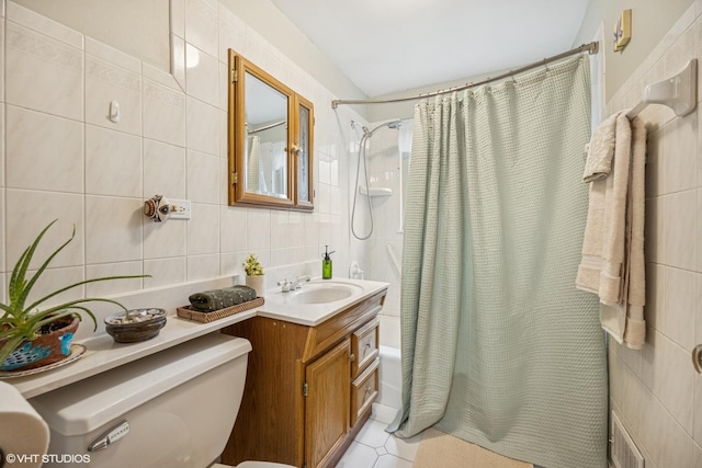 273 Desplaines Ave, Riverside, IL 60546 - full bath with tile walls, toilet, shower / tub combo with curtain, decorative backsplash, and vanity
