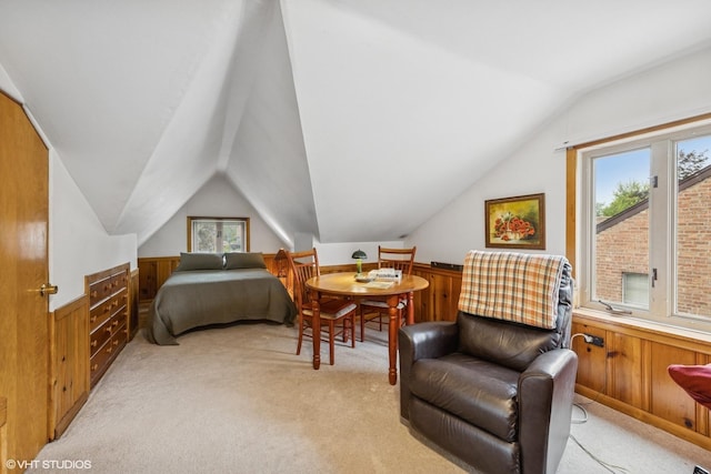 273 Desplaines Ave, Riverside, IL 60546 - bedroom featuring light colored carpet, lofted ceiling, a wainscoted wall, and wooden walls