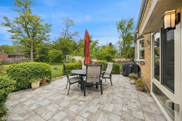 273 Desplaines Ave, Riverside, IL 60546 - fenced backyard with a patio and outdoor dining space