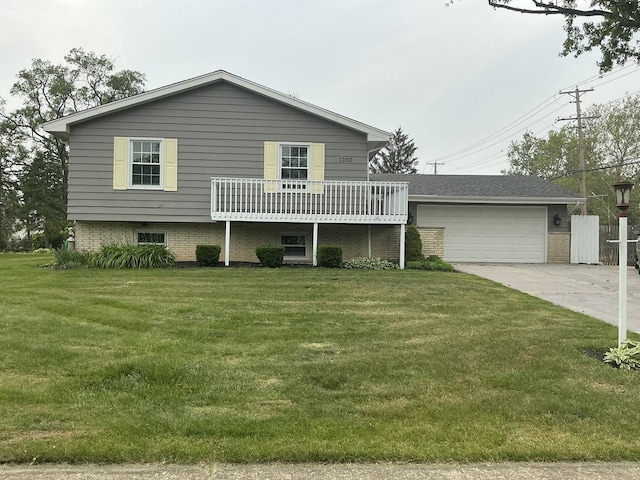 1000 S Ahrens Ave, Lombard, IL 60148 - split level home featuring a front lawn, a deck, and a garage