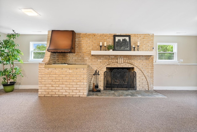 1000 S Ahrens Ave, Lombard, IL 60148 - unfurnished living room with carpet floors, a brick fireplace, and plenty of natural light