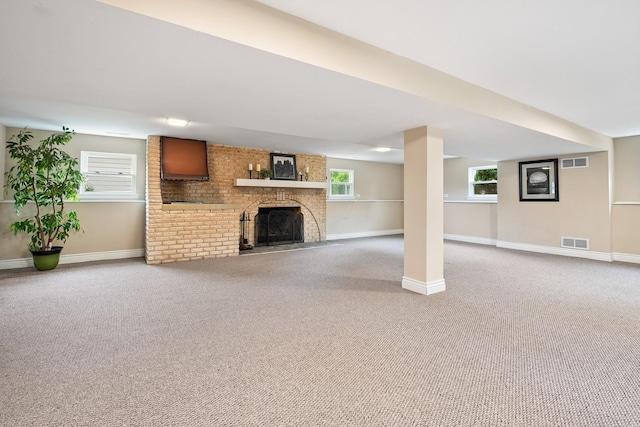 1000 S Ahrens Ave, Lombard, IL 60148 - unfurnished living room with light carpet, a brick fireplace, and healthy amount of natural light