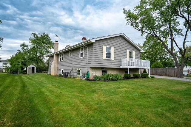 1000 S Ahrens Ave, Lombard, IL 60148 - rear view of property featuring a chimney and a shed