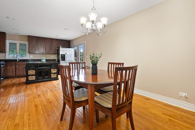 1000 S Ahrens Ave, Lombard, IL 60148 - dining space with light wood-style flooring, a chandelier, and recessed lighting